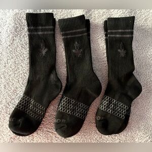 NEW.  Bombas black crew socks. Size medium. Three pairs for $21.